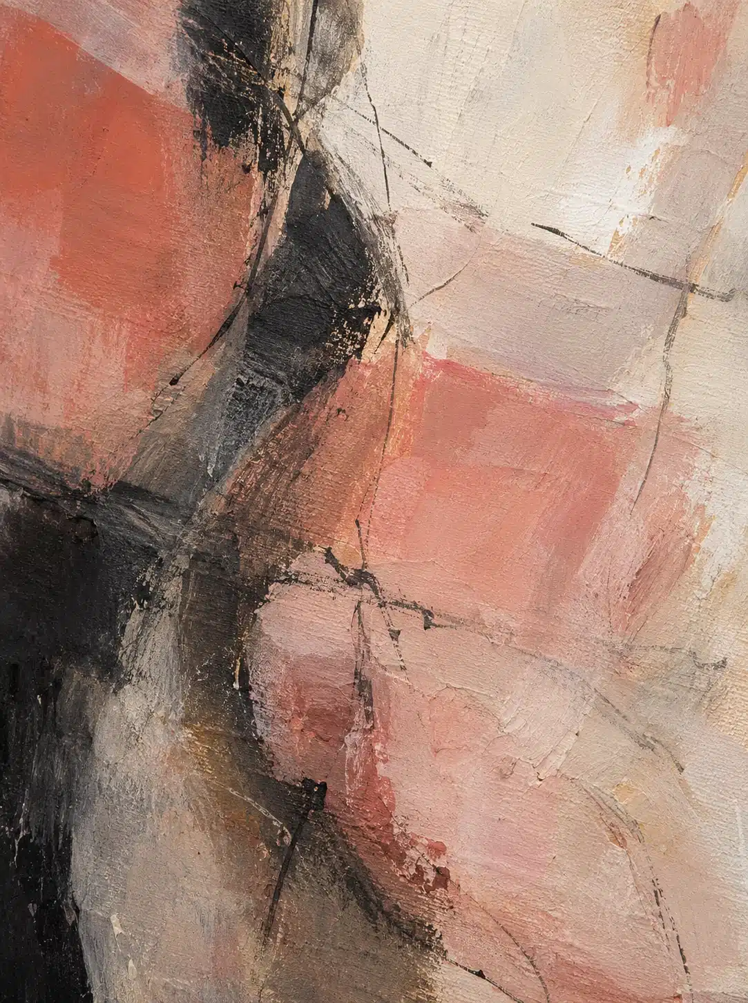 Close view of an original painting's layered coral and charcoal surface in soft side light.